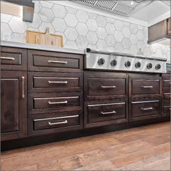 brown cabinets with white countertops