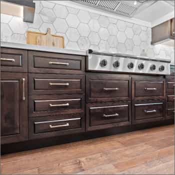 brown cabinets with white countertops