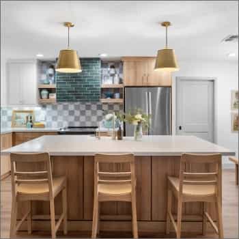 kitchen front view of green brick with white counters