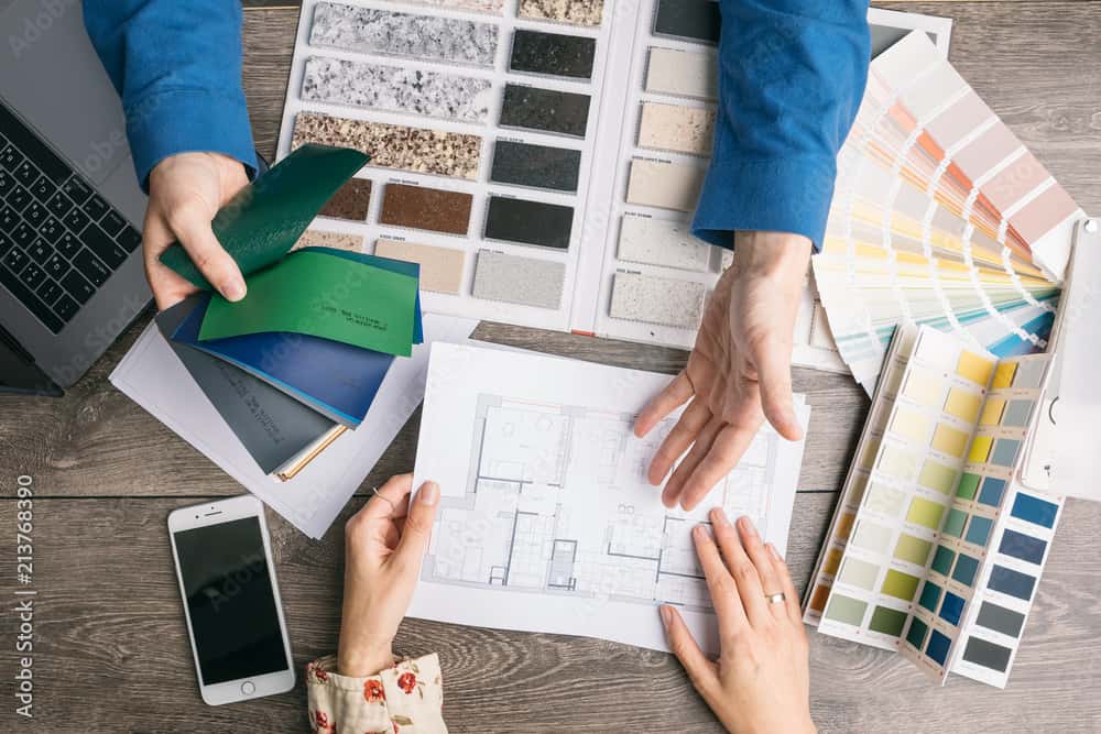 overtop shot of 2 people planning a closet